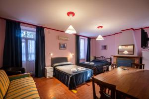 TV a/nebo společenská místnost v ubytování Residenza Arcadia