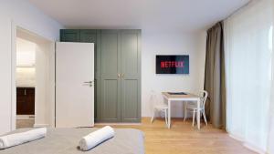 TV a/nebo společenská místnost v ubytování NEW Studio by Nivy & Bus Station w AC