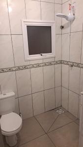 Et badeværelse på Casa Fávero - Rua Peri + 5 billeder