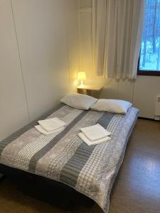 En eller flere senge i et værelse på Studio # 16