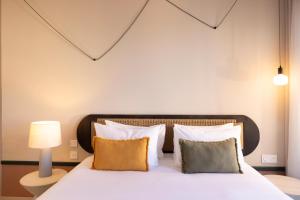 Postel nebo postele na pokoji v ubytování Crisol Promenade