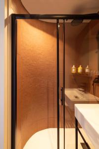 Koupelna v ubytování Crisol Promenade + 17 fotografií