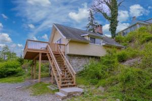 a house with a wooden staircase in front of it at Boat House in Downingtown