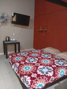 En eller flere senge i et værelse på Hotel Z Los Tilos