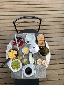 a table with a tray of food on a table at Casa Mirador Pichilemu in Pichilemu