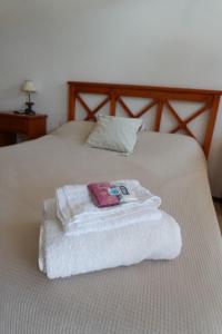 Giường trong phòng chung tại Aparthotel Agave