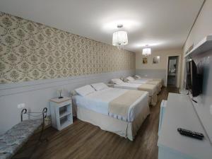 Et tv og/eller underholdning på Pousada Serrano Village - 2km do Capivari