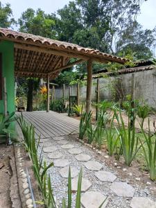 En have udenfor Casinha Verde- Hospedagem Itaobi - Arraial d Ajuda - Pedra Azul-Estrada da Pitinga