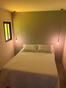 En eller flere senge i et værelse på Quinta Lincoln