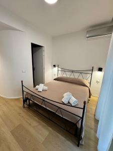 En eller flere senge i et værelse på Lungomare Vazzana + 18 billeder