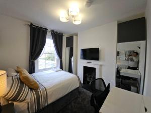 Et tv og/eller underholdning på Central Maison Indigo