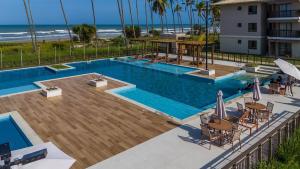 Bazén v ubytování Viva com Conforto e Clima de Resort - Pé na areia nebo v jeho okolí