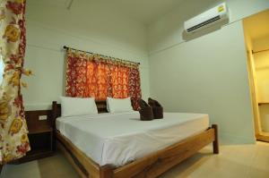 Katil atau katil-katil dalam bilik di Phi Phi Twin Palms Bungalow