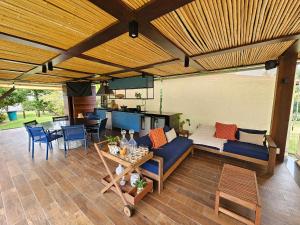 Posezení v ubytování Chalé de Luxo no Meridional Club Praia dos Carneiros