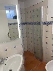 Koupelna v ubytování Campos Essencia + 27 fotografií