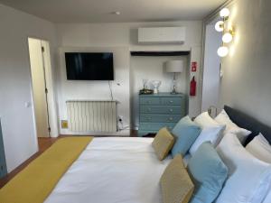 Postel nebo postele na pokoji v ubytování Campos Essencia