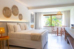 En eller flere senge i et værelse på Porto Seguro Praia Resort All Inclusive - Oficial + 70 billeder
