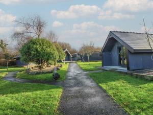a driveway leading to a house at Glamping Pod 9 - Gower in Swansea