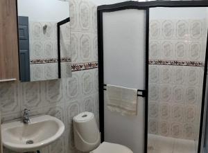 Et badeværelse på Nuevo Olimpo 202 Family Central and quiet