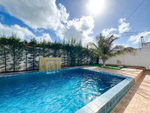 Swimmingpoolen hos eller tæt på Eficiência - Casa Recanto dos Ventos