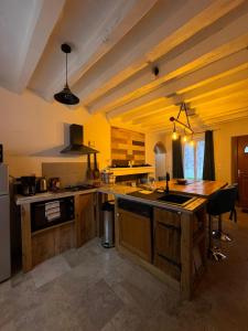 Køkken eller tekøkken på Maison de campagne proche des Châteaux et Beauval