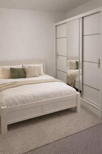 En eller flere senge i et værelse på Apartmán Na Pavlači