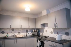 Køkken eller tekøkken på Oxford sweet home + 30 billeder