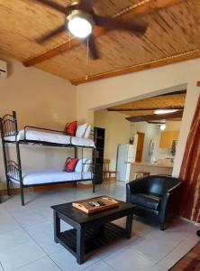 Postel nebo postele na pokoji v ubytování Nagenoeg Guest House