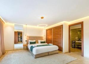 a bedroom with a large bed in a room at Stay tanger in Tangier