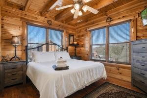 En eller flere senge i et værelse på Mystic Sunrise