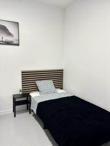 Postel nebo postele na pokoji v ubytování Casa Capitan Coliving Digital Nomads