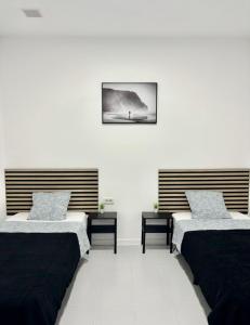 Postel nebo postele na pokoji v ubytování Casa Capitan Coliving Digital Nomads