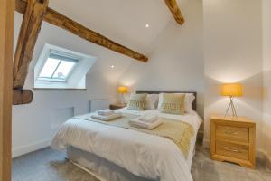 a bedroom with a bed and a window at 3 Bed in Bala oc-bow69 in Bala