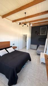 Giường trong phòng chung tại Gran casa para 8 personas Quequen Beach