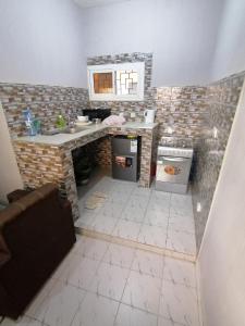 Køkken eller tekøkken på Résidence hibis chez M&B