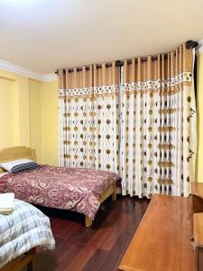 Ένα ή περισσότερα κρεβάτια σε δωμάτιο στο Departamento en Ciudad Satélite, cerca del Aeropuerto