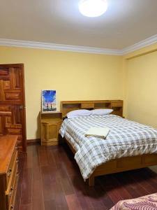 Ένα ή περισσότερα κρεβάτια σε δωμάτιο στο Departamento en Ciudad Satélite, cerca del Aeropuerto