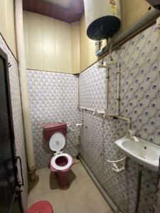 Et badeværelse på Annu Bhai Sewa Sadan