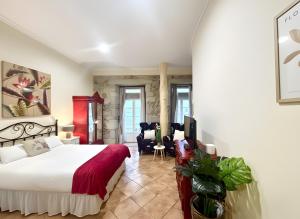 En eller flere senge i et værelse på Holibai, Vermello, Un rincón con encanto cerca de la playa