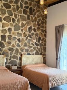 En eller flere senge i et værelse på Cábaña bonita vista + 39 billeder