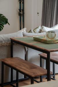 En eller flere senge i et værelse på Central City Queenstown Retreat - 3 Bedroom Apartment