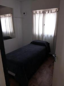 Postel nebo postele na pokoji v ubytování Necochea tu lugar