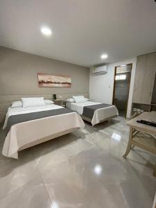 En eller flere senge i et værelse på Hotel Ancor + 49 billeder