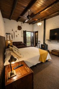 En eller flere senge i et værelse på Apart Suite Rural, hidromasajes doble, pileta, Grupo Cabaña La Triada