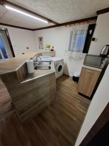 Køkken eller tekøkken på Апартамент "Цвети"