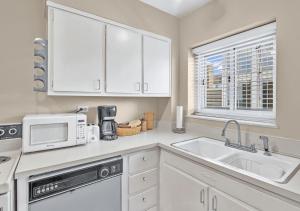 Køkken eller tekøkken på World Cup Traveler Package Flat Rate Arena Footsteps Away