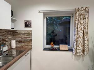 Køkken eller tekøkken på Frisch renovierte Privatunterkunft in Kulmbach + 11 billeder