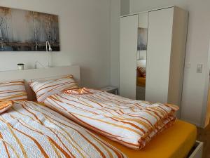 En eller flere senge i et værelse på Frisch renovierte Privatunterkunft in Kulmbach