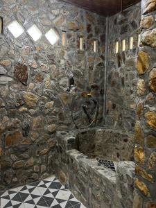 Koupelna v ubytování Rinte Green Village & Bukit Lawang Jungle Trekking