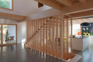 a staircase in a house with wooden walls at Casa Del Castell in Móra d'Ebre